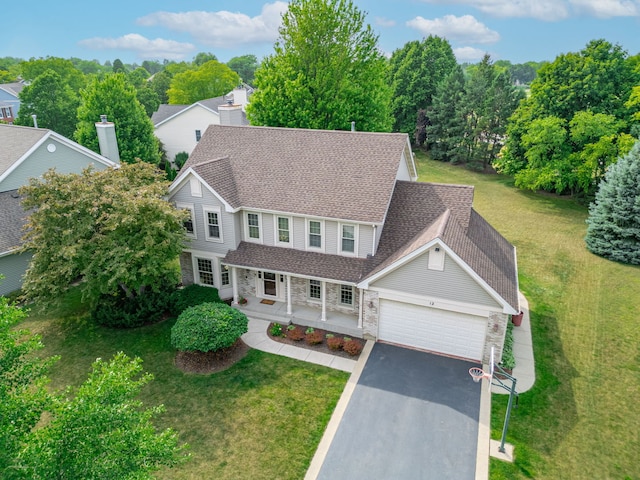12 White Oak Ct, Algonquin, IL 60102 - traditional-style home with a porch, an attached garage, a shingled roof, and stone siding