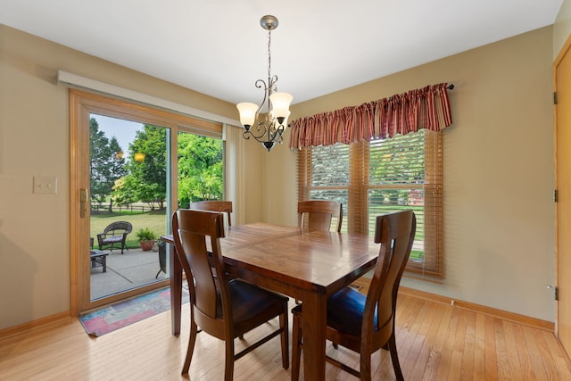 12 White Oak Ct, Algonquin, IL 60102 - dining space featuring a chandelier and light wood finished floors