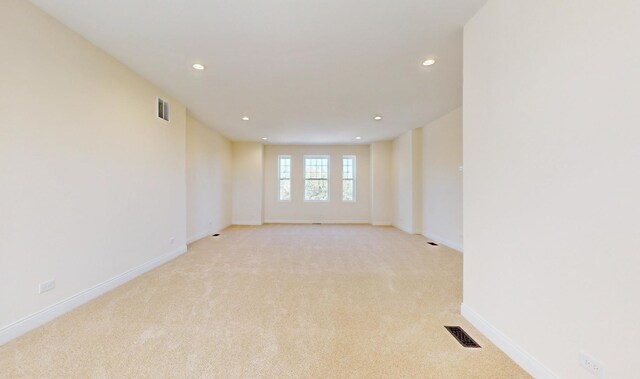 4450 S Prairie Ave, Chicago, IL 60653 - spare room featuring light colored carpet and recessed lighting