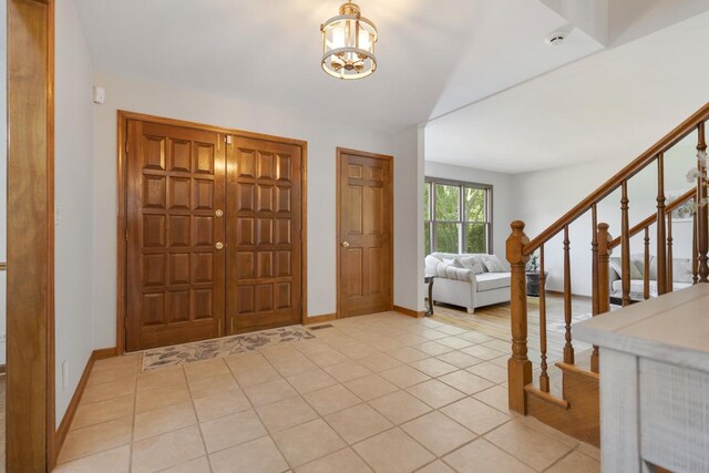 21326 N Elder Ct, Kildeer, IL 60047 - entrance foyer featuring a chandelier, stairs, and light tile patterned floors