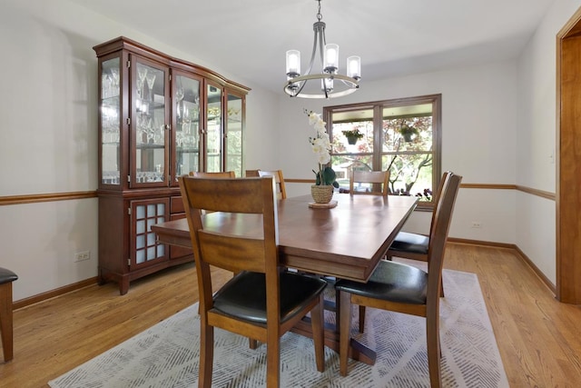 21326 N Elder Ct, Kildeer, IL 60047 - dining area featuring a chandelier and light wood-style floors