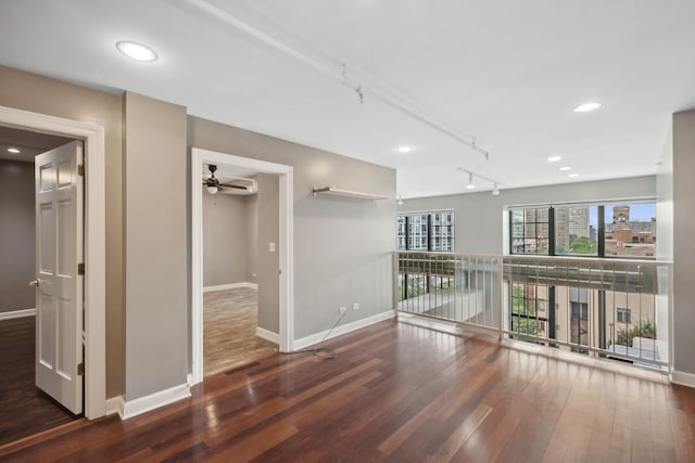 70 E 18th St Unit 4E, Chicago, IL 60616 - unfurnished room with hardwood / wood-style floors, ceiling fan, recessed lighting, and rail lighting