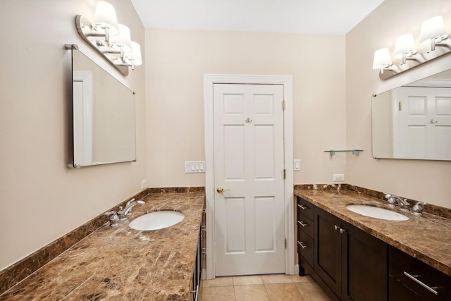 70 E 18th St Unit 4E, Chicago, IL 60616 - bathroom featuring two vanities and tile patterned flooring