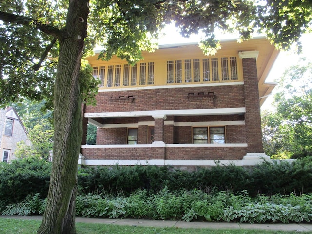 1101 N Hart St, Harvard, IL 60033 - back of house featuring brick siding