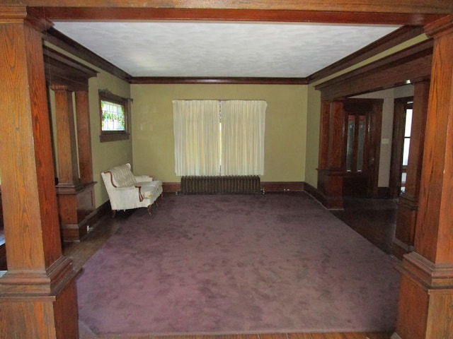 1101 N Hart St, Harvard, IL 60033 - unfurnished room with radiator, ornate columns, and crown molding