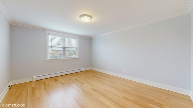 6333 N Milwaukee Ave Unit 2E, Chicago, IL 60646 - spare room featuring baseboard heating, light wood-type flooring, and crown molding