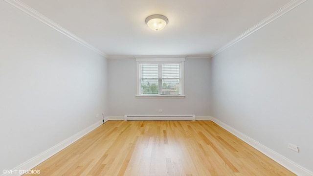 6333 N Milwaukee Ave Unit 2E, Chicago, IL 60646 - spare room featuring a baseboard heating unit, light wood finished floors, and crown molding