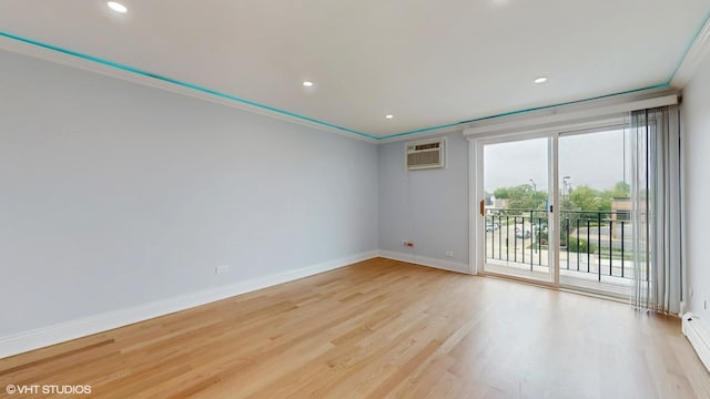 6333 N Milwaukee Ave Unit 2E, Chicago, IL 60646 - unfurnished room with a wall mounted AC, crown molding, light wood-style flooring, and recessed lighting