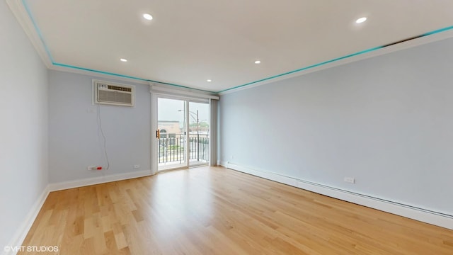 6333 N Milwaukee Ave Unit 2E, Chicago, IL 60646 - spare room featuring a baseboard radiator, light wood-style floors, recessed lighting, a wall mounted AC, and crown molding