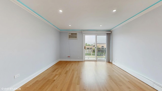 6333 N Milwaukee Ave Unit 2E, Chicago, IL 60646 - unfurnished room with a wall mounted AC, light wood-style flooring, a baseboard heating unit, recessed lighting, and crown molding