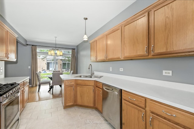 8422 Stratford Dr Unit 8422, Tinley Park, IL 60487 - kitchen featuring stainless steel appliances, light countertops, hanging light fixtures, a peninsula, and light tile patterned floors