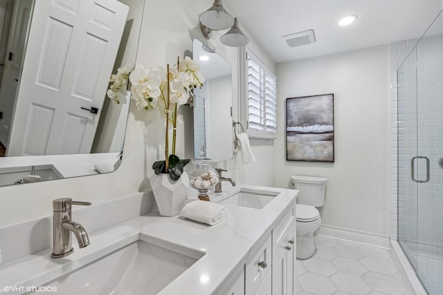 301 E 59th St, Hinsdale, IL 60521 - bathroom with a shower stall, double vanity, and tile patterned floors