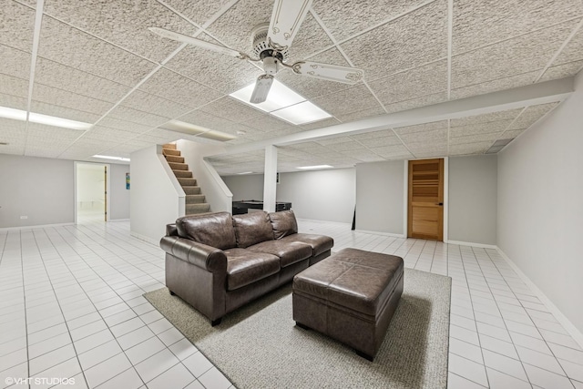 301 E 59th St, Hinsdale, IL 60521 - living area with tile patterned flooring, stairway, and a drop ceiling