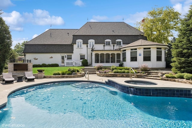 301 E 59th St, Hinsdale, IL 60521 - outdoor pool featuring an in-ground hot tub, a patio, and a sunroom