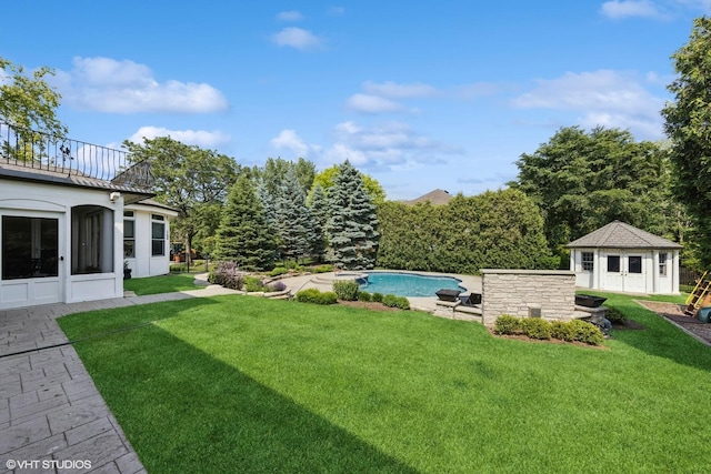 301 E 59th St, Hinsdale, IL 60521 - view of grassy yard with an outdoor pool, an outdoor structure, a patio, and a balcony