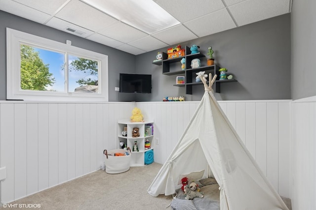 0N101 Pleasant Hill Rd, Wheaton, IL 60187 - playroom with carpet flooring, a drop ceiling, and a wainscoted wall