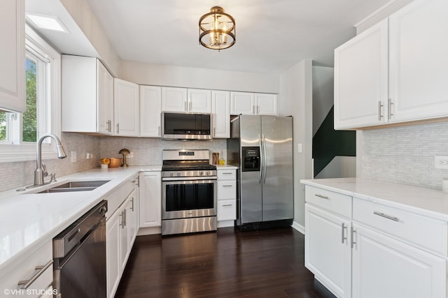0N101 Pleasant Hill Rd, Wheaton, IL 60187 - kitchen featuring appliances with stainless steel finishes, decorative backsplash, and white cabinetry