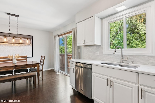 0N101 Pleasant Hill Rd, Wheaton, IL 60187 - kitchen featuring stainless steel dishwasher, backsplash, light countertops, dark wood-style floors, and white cabinets