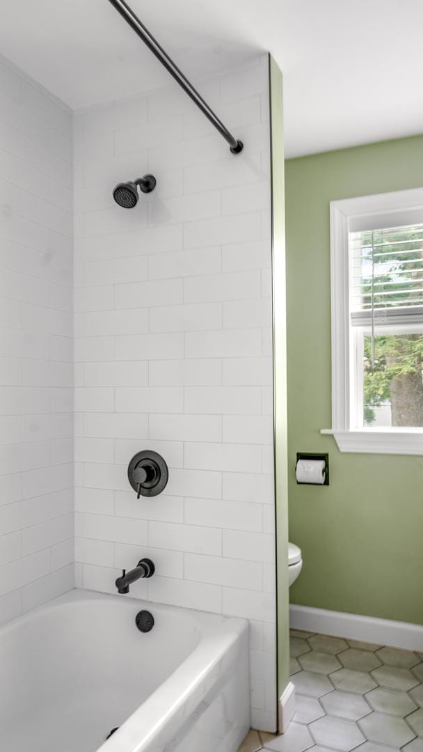 805 S Anderson St, Urbana, IL 61801 - full bathroom featuring tile patterned floors and washtub / shower combination