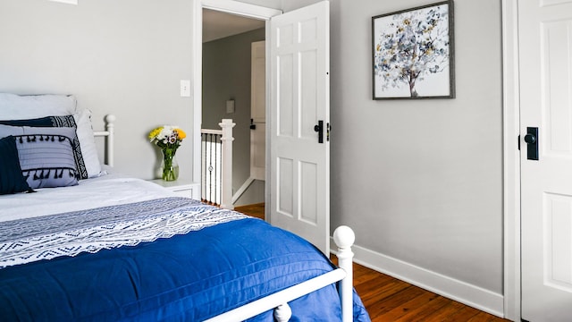 805 S Anderson St, Urbana, IL 61801 - bedroom featuring wood finished floors and baseboards