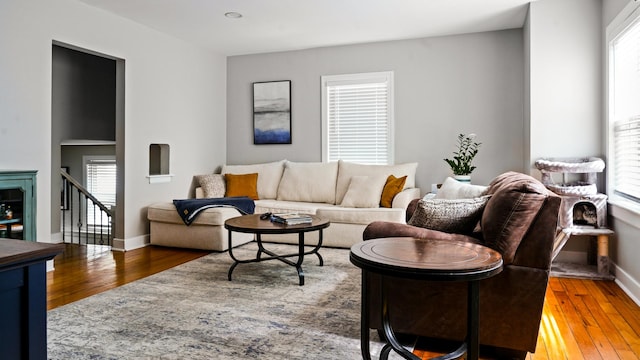 805 S Anderson St, Urbana, IL 61801 - living area featuring hardwood / wood-style flooring, healthy amount of natural light, and stairs