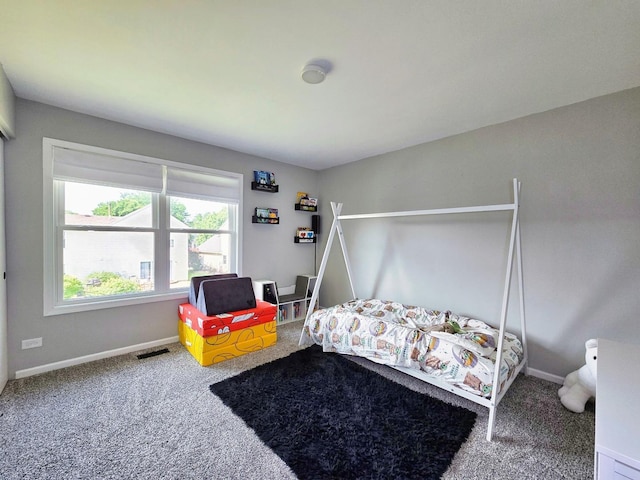 2440 Pebblewood Ct, Aurora, IL 60506 - carpeted bedroom with baseboards