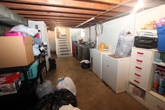 324 Illinois St, Joliet, IL 60436 - unfinished basement featuring washing machine and clothes dryer, stairs, and fridge