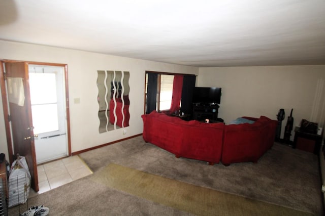324 Illinois St, Joliet, IL 60436 - carpeted living room featuring baseboards and tile patterned floors