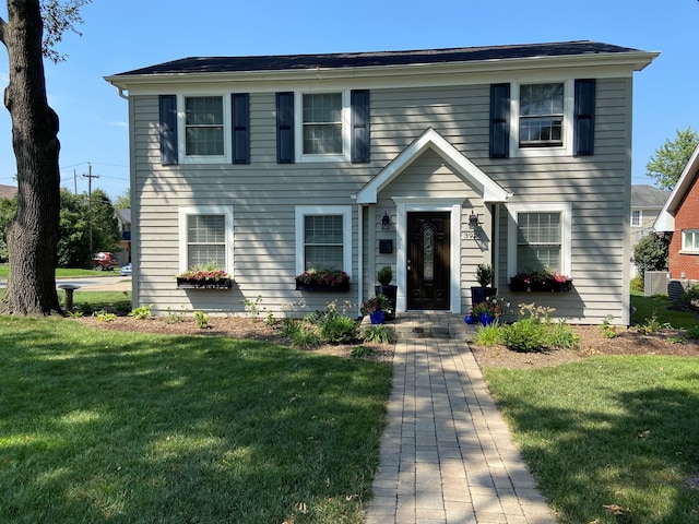 3976 Western Ave, Western Springs, IL 60558 - colonial home featuring a front lawn