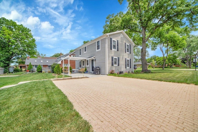 3976 Western Ave, Western Springs, IL 60558 - view of front of home with a patio and a front yard