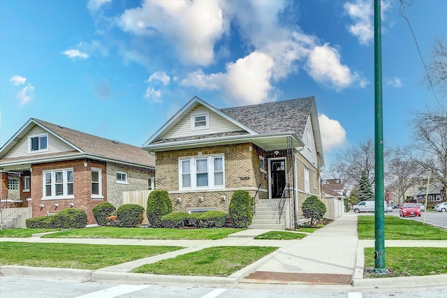 6100 W Byron St, Chicago, IL 60634 - bungalow with brick siding and a front yard