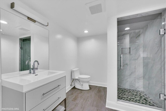 6100 W Byron St, Chicago, IL 60634 - full bath featuring a marble finish shower, vanity, and recessed lighting