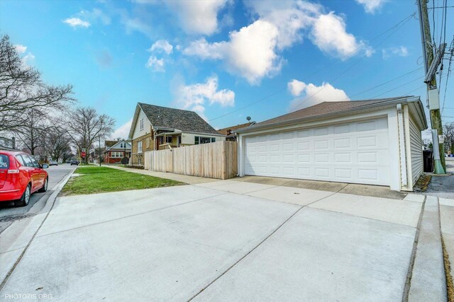 6100 W Byron St, Chicago, IL 60634 - view of home's exterior with a detached garage