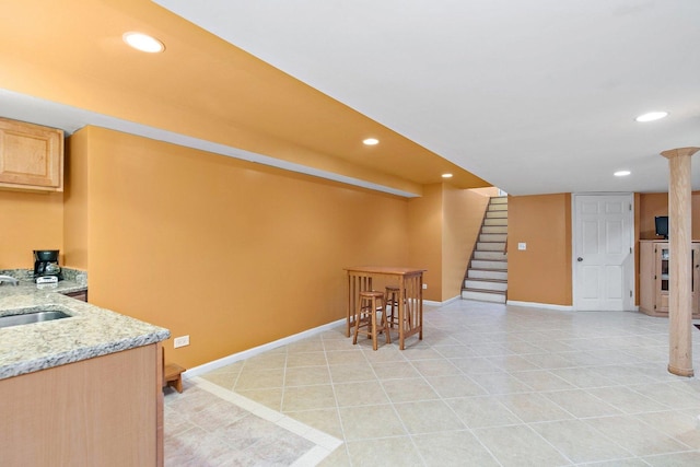 1531 Cumberland Pkwy, Algonquin, IL 60102 - kitchen with recessed lighting, light stone counters, light tile patterned floors, and light brown cabinets
