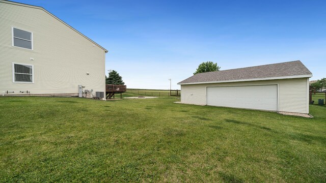 1420 Kennedy Dr, Kirkland, IL 60146 - view of grassy yard featuring a garage and an outdoor structure