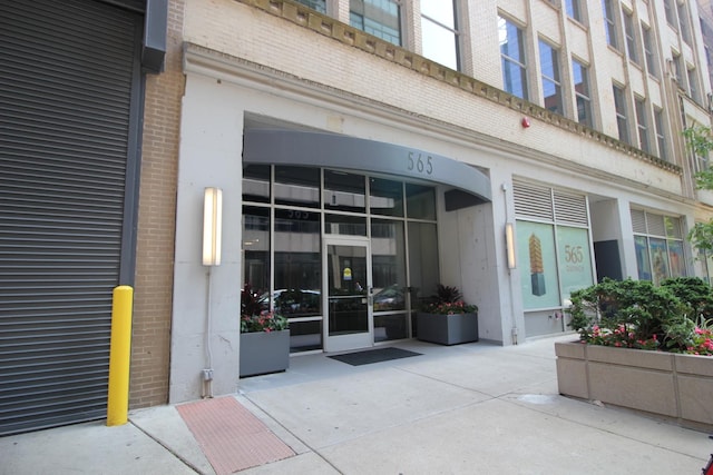 565 W Quincy St Unit 912, Chicago, IL 60661 - doorway to property featuring brick siding