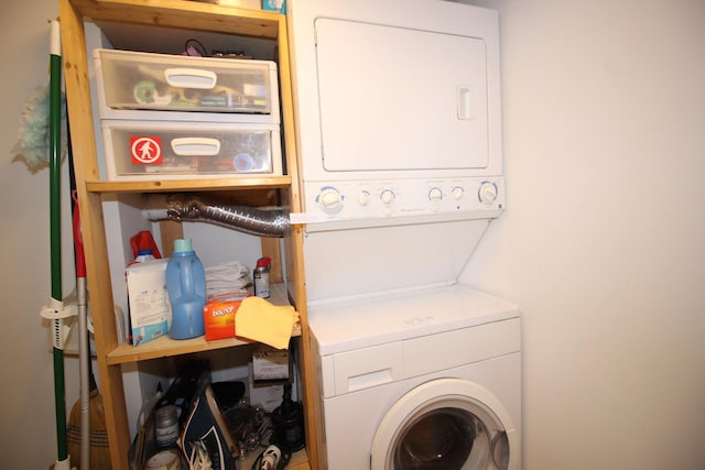 565 W Quincy St Unit 912, Chicago, IL 60661 - washroom featuring stacked washing machine and dryer