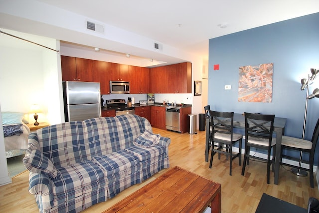 565 W Quincy St Unit 912, Chicago, IL 60661 - living room featuring light wood-style flooring