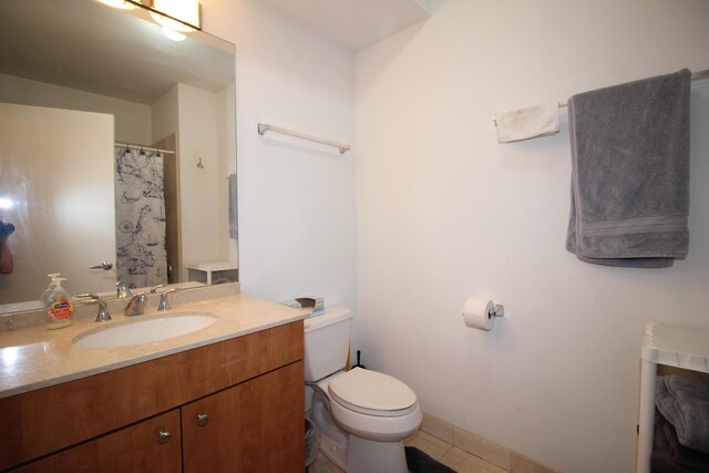 565 W Quincy St Unit 912, Chicago, IL 60661 - full bathroom featuring vanity, tile patterned flooring, and a shower with shower curtain