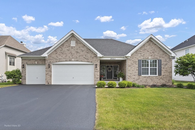 25313 W Rock Dr, Plainfield, IL 60586 - ranch-style house with brick siding, driveway, a front lawn, an attached garage, and roof with shingles