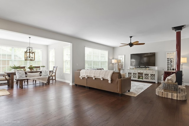 25313 W Rock Dr, Plainfield, IL 60586 - living area with dark wood finished floors, ceiling fan, and healthy amount of natural light