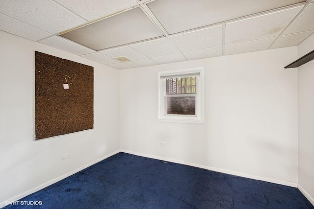 82 Hickory Ln, Cary, IL 60013 - carpeted empty room with a paneled ceiling