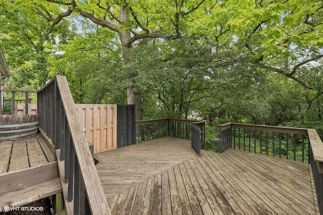 82 Hickory Ln, Cary, IL 60013 - wooden deck featuring view of wooded area