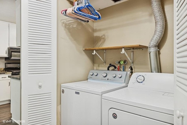 82 Hickory Ln, Cary, IL 60013 - laundry room featuring washing machine and clothes dryer