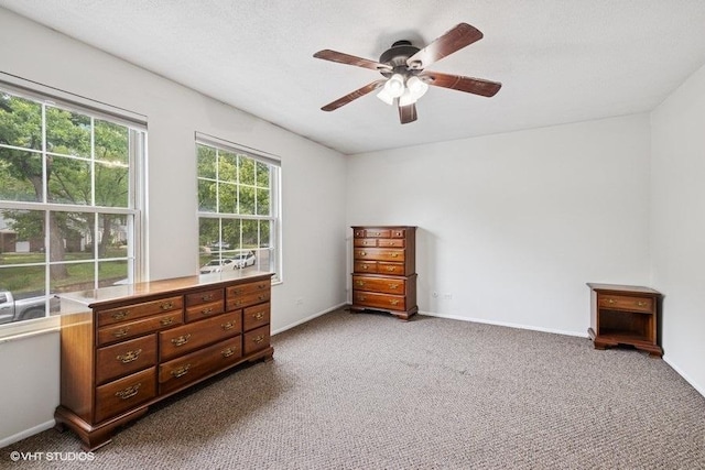 82 Hickory Ln, Cary, IL 60013 - carpeted bedroom with baseboards and a ceiling fan