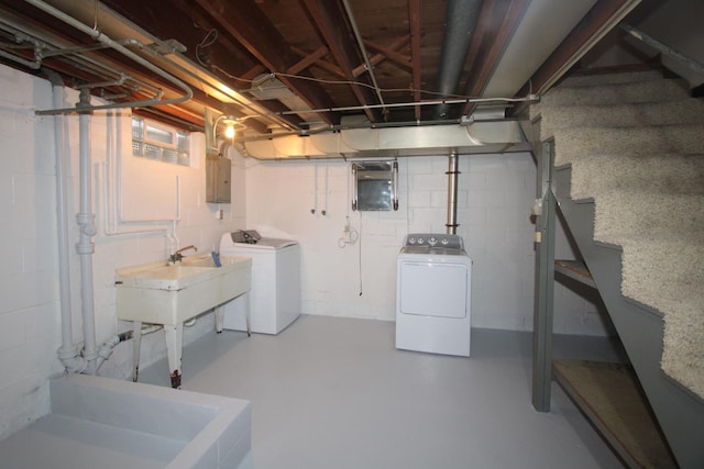 328 Dwight Ave, Joliet, IL 60436 - unfinished below grade area featuring electric panel, washing machine and clothes dryer, stairway, and concrete block wall