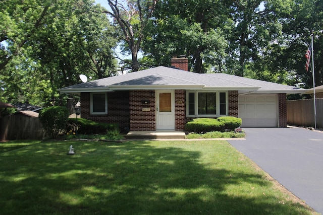 328 Dwight Ave, Joliet, IL 60436 - single story home featuring a garage, asphalt driveway, brick siding, and a chimney