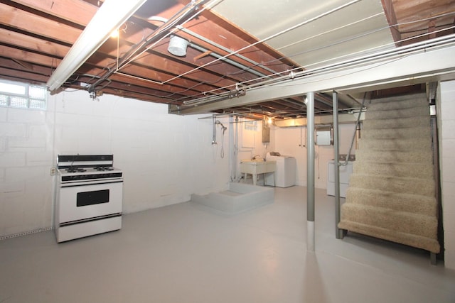 328 Dwight Ave, Joliet, IL 60436 - below grade area with washing machine and dryer, stairway, and electric panel