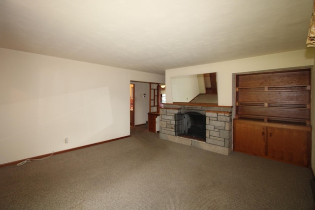 328 Dwight Ave, Joliet, IL 60436 - unfurnished living room with a fireplace and carpet flooring
