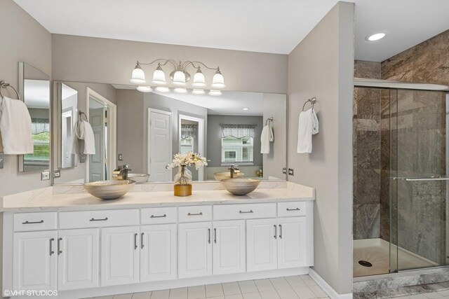 527 Capital Ln, Gurnee, IL 60031 - bathroom featuring double vanity, a stall shower, plenty of natural light, and tile patterned flooring